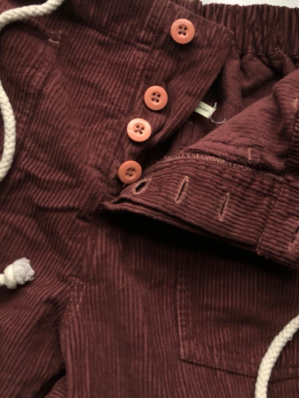 Kimchi Blue Corduroy Drawstring Trousers in Burgundy